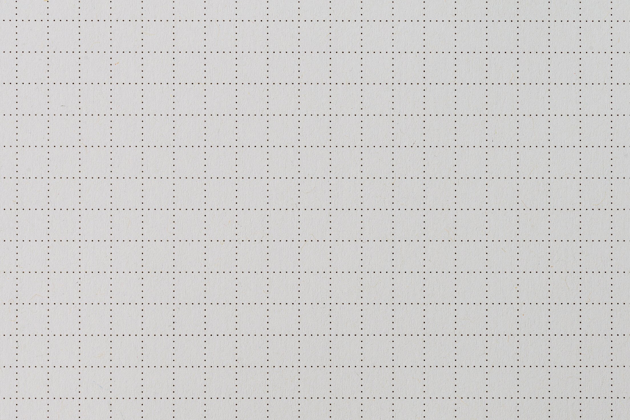 White paper dotted grid pattern